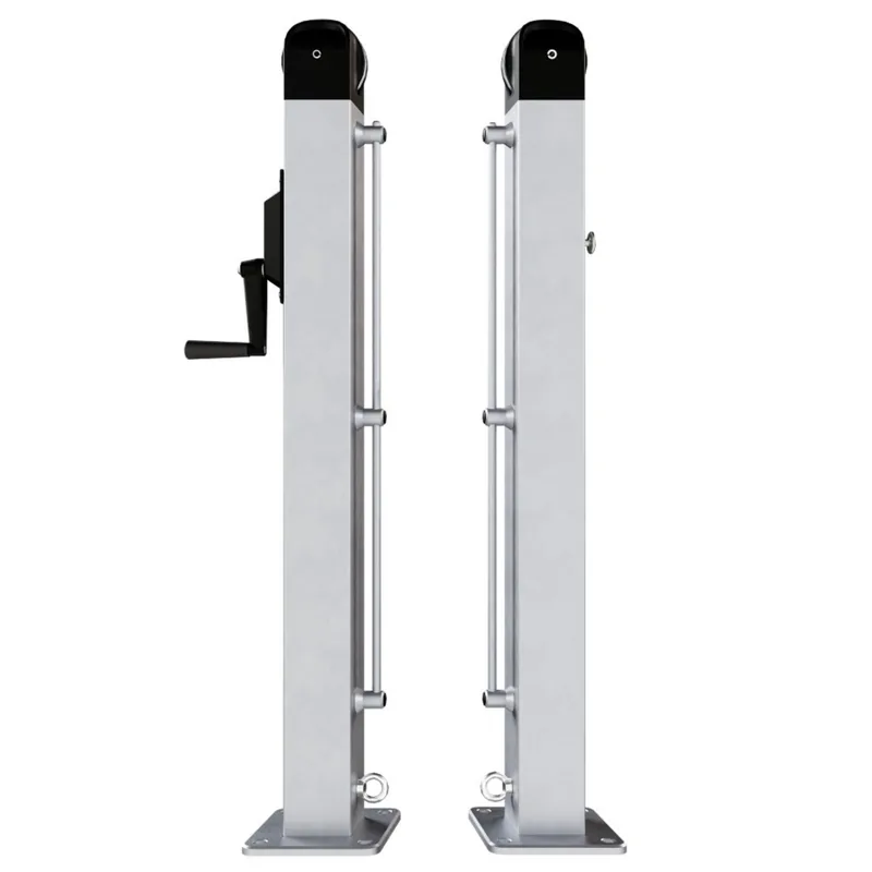 Pair of Dominator surface mount pickleball posts with base plates and a tension crank